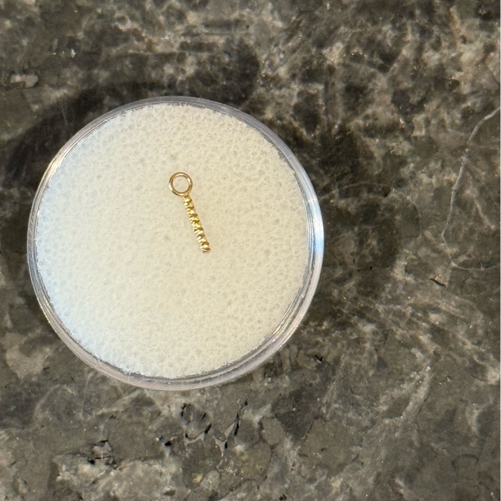 Yellow gold charm